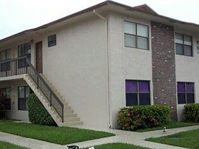 Photo of 10050 Winding Lake Road #103, Sunrise, FL 33351 (MLS # B26014826)
