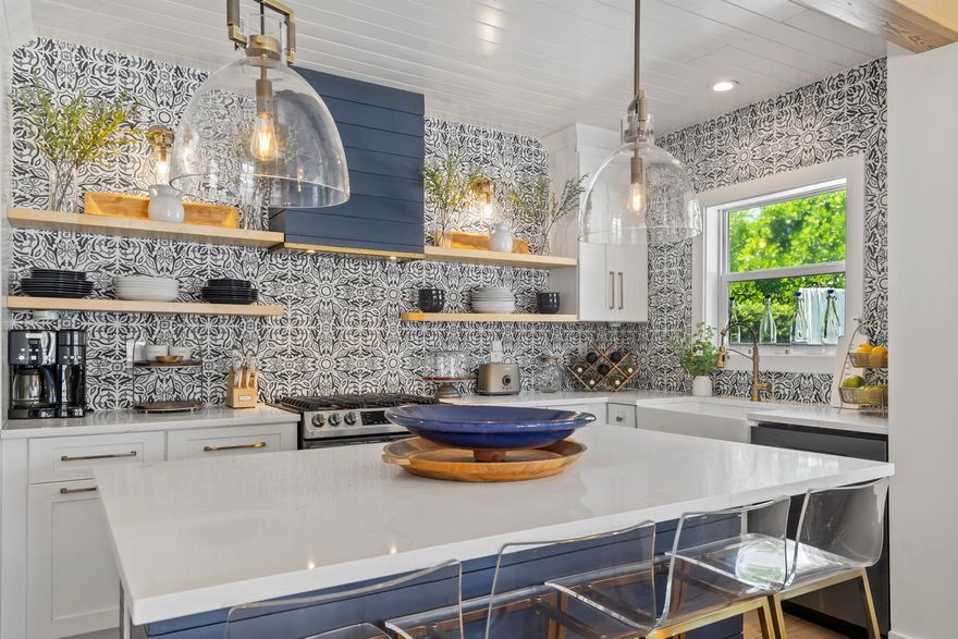Casa L'Aqua in Chapel Hill offers a rare opportunity to own a fully furnished, custom-renovated home designed with both lifestyle and investment potential in mind. This 3BD/3BA residence with a private den/flex room showcases elegant finishes, open living spaces, abundant natural light, and a new metal roof (2024). Enjoy seamless indoor-outdoor flow with a pool, summer kitchen, and expansive patio ideal for entertaining. Perfect for full-time living or generating rental income, this turnkey property combines comfort, flexibility, and a prime location just minutes to Delray Beach's vibrant Atlantic Avenue, beaches, dining, and shopping--an exceptional opportunity in one of the area's most desirable neighborhoods.