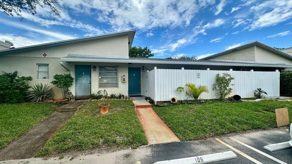Photo of 3000 NW 5th Terrace #107, Pompano Beach, FL 33064 (MLS # B26072784)