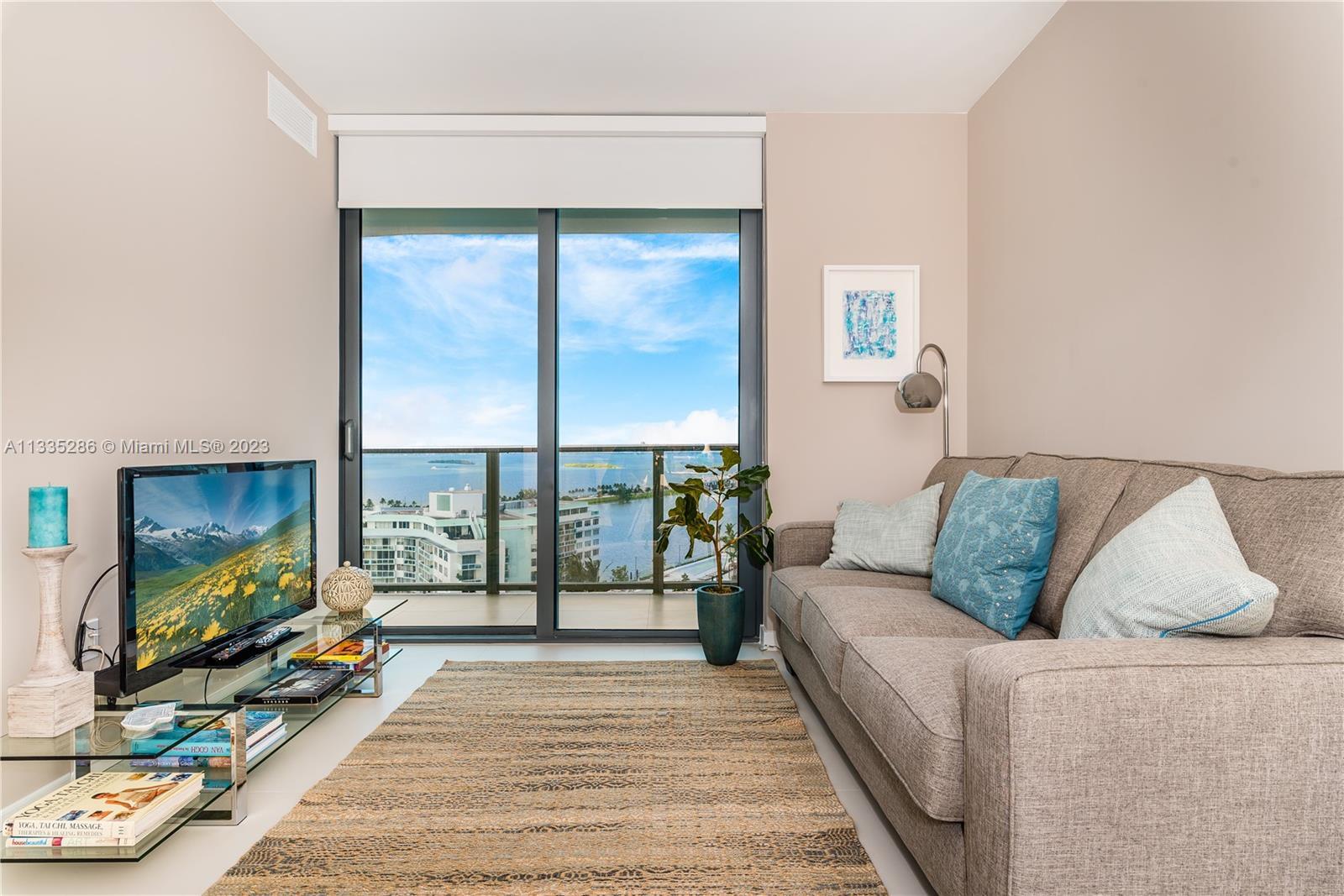 This fantastic 1 bed, 1.5 bath condo in the Paraiso Complex/Edgewater offers stunning views of the intracoastal, pool and tennis courts. Features include white porcelain floors, walk-in closets, top-of-the-line BOSCH appliances in the open kitchen, in-unit w/d. Offers club-like amenities, including 2 pools, rooftop pool has jacuzzi, and BBQ with breathtaking city and bay views, and fitness center; the additional pool with cabanas, jacuzzi, spa, tennis courts, party room, kids room. Valet, security, and shops and restaurants are also available on-site. The location is perfect, situated in the heart of Miami's hottest area and within walking distance to Downtown, Wynwood, Midtown, and the Design District.
