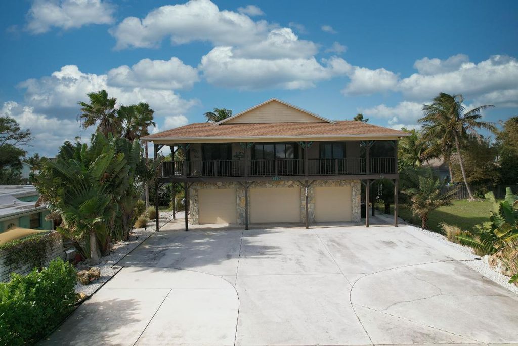 Photo of 1111 S Ocean Drive, Fort Pierce, FL 34949 (MLS # R10943202)