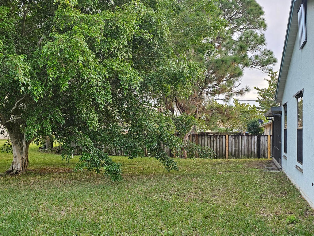 Photo of 309 NW Hogan Street, Port Saint Lucie, FL 34983 (MLS # R10950823)