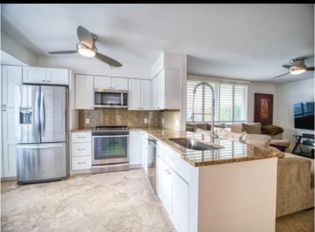 Photo of 123 Yacht Club Way, Hypoluxo, FL 33462 (MLS # B26071098)