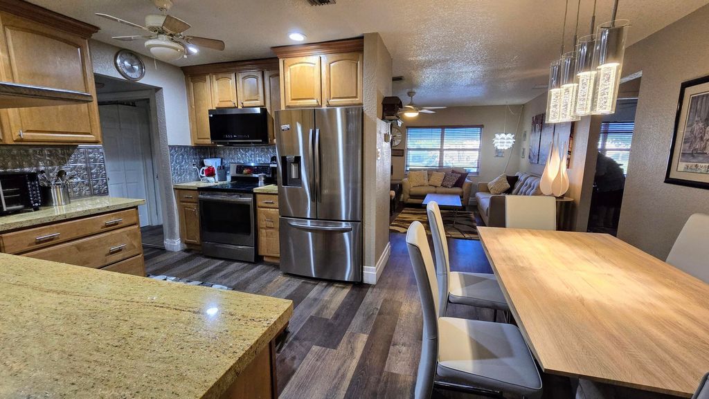 Photo of 4871 NW 13th Avenue, Deerfield Beach, FL 33064 (MLS # R11126043)