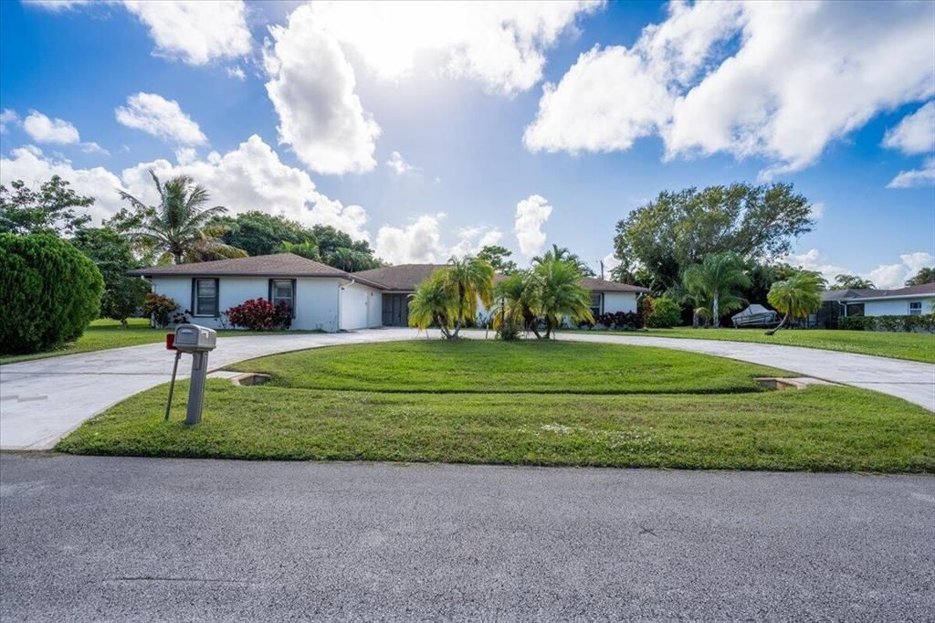 Photo of 2022 SE Pyramid Road, Port Saint Lucie, FL 34952 (MLS # R10762093)