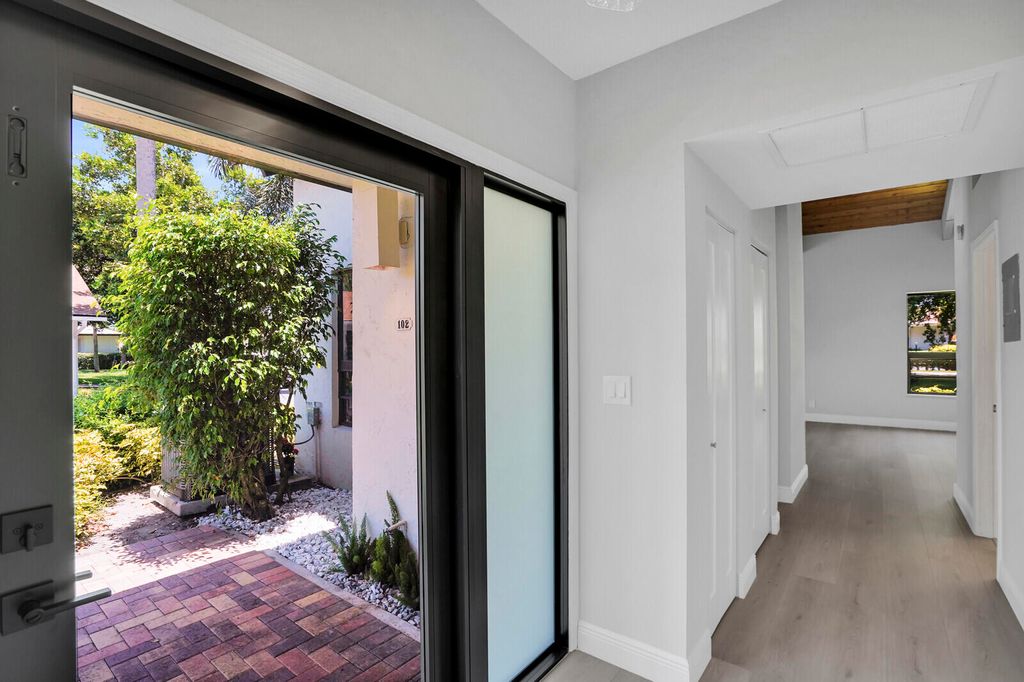 Photo of 730 Greensward Court #102-J, Delray Beach, FL 33445 (MLS # R11100502)