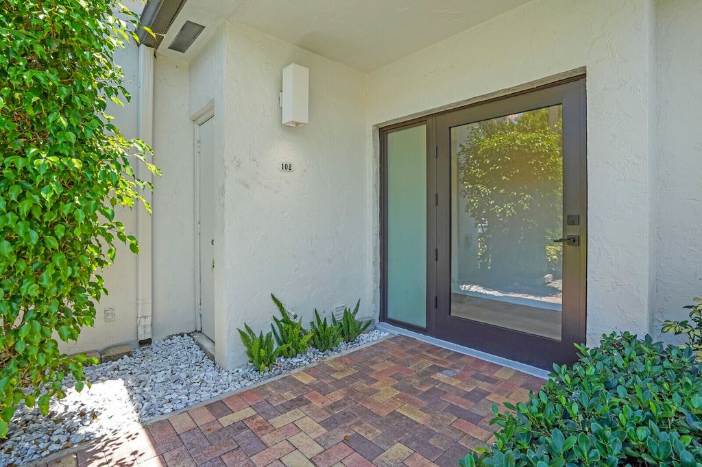 Photo of 730 Greensward Court #102-J, Delray Beach, FL 33445 (MLS # R11100502)