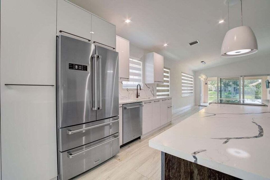 Photo of 2802 Livingston Lane, West Palm Beach, FL 33411 (MLS # R11002532)