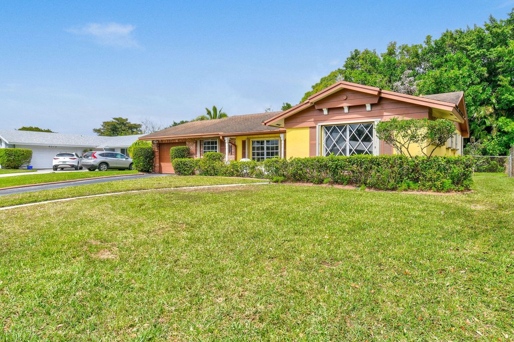 Photo of 4361 Daffodil Circle S, Palm Beach Gardens, FL 33410 (MLS # R11068648)