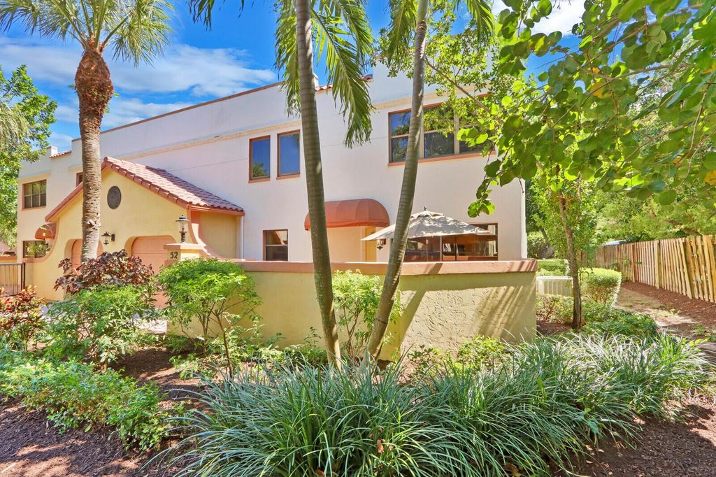 Photo of 52 Uno Lago Drive, Juno Beach, FL 33408 (MLS # R10891471)