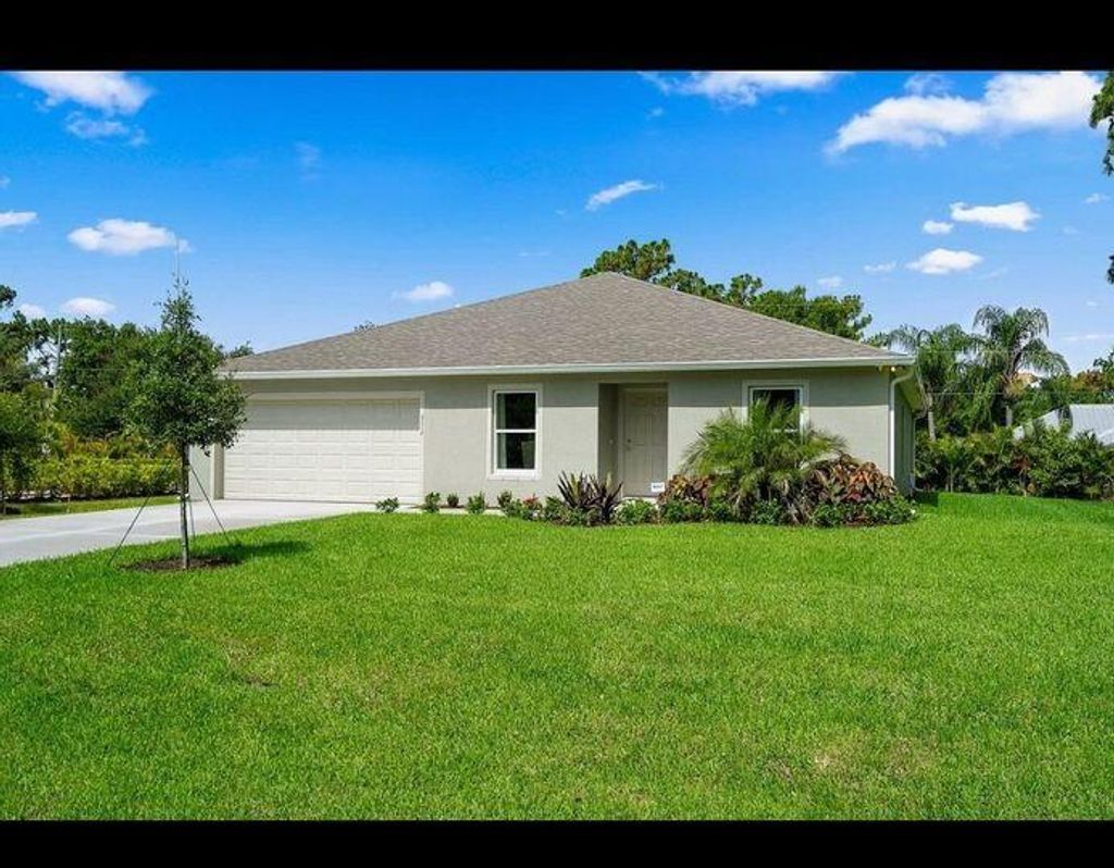 Photo of 6718 NW Dorothy Street, Port St Lucie, FL 34983 (MLS # R10933988)