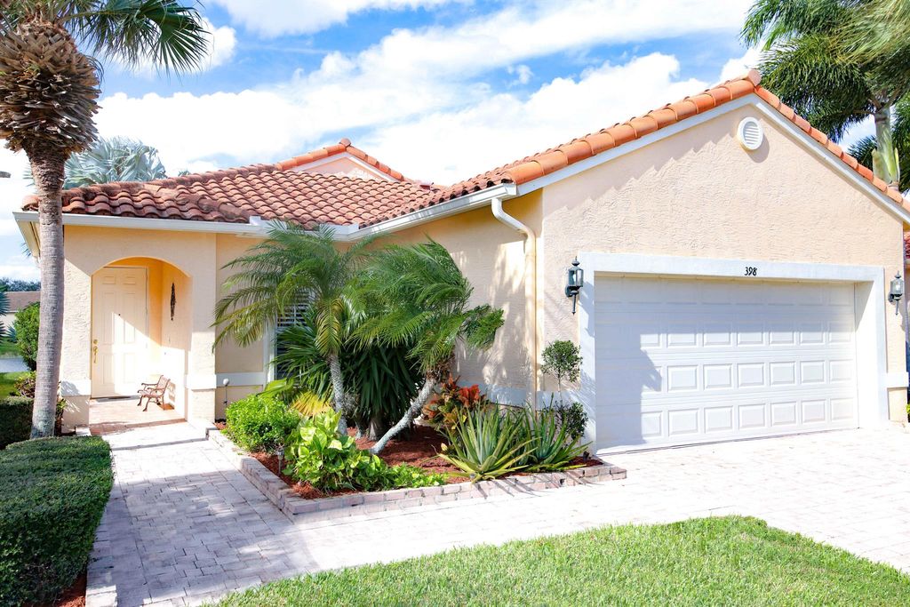 Photo of 398 NW Breezy Point Loop, Port Saint Lucie, FL 34986 (MLS # R10943213)