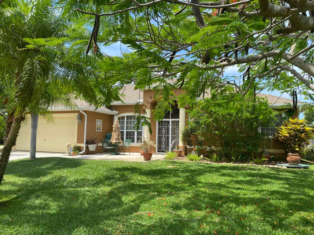 Photo of 3001 SE Miracle Lane, Port Saint Lucie, FL 34952 (MLS # R10803656)