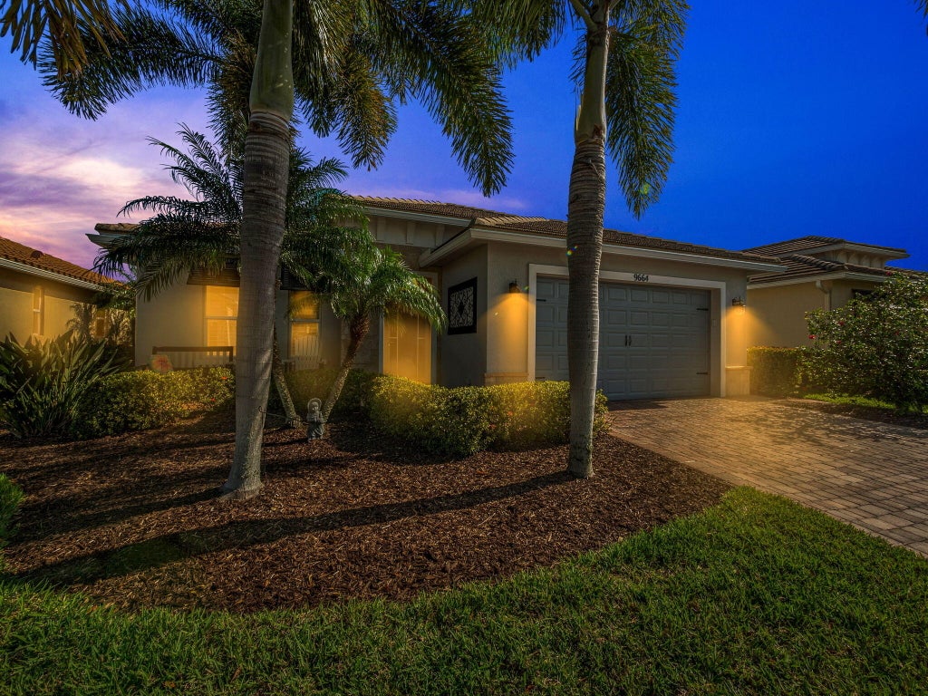 Photo of 9664 SW Royal Poinciana Drive, Port Saint Lucie, FL 34987 (MLS # R11064109)