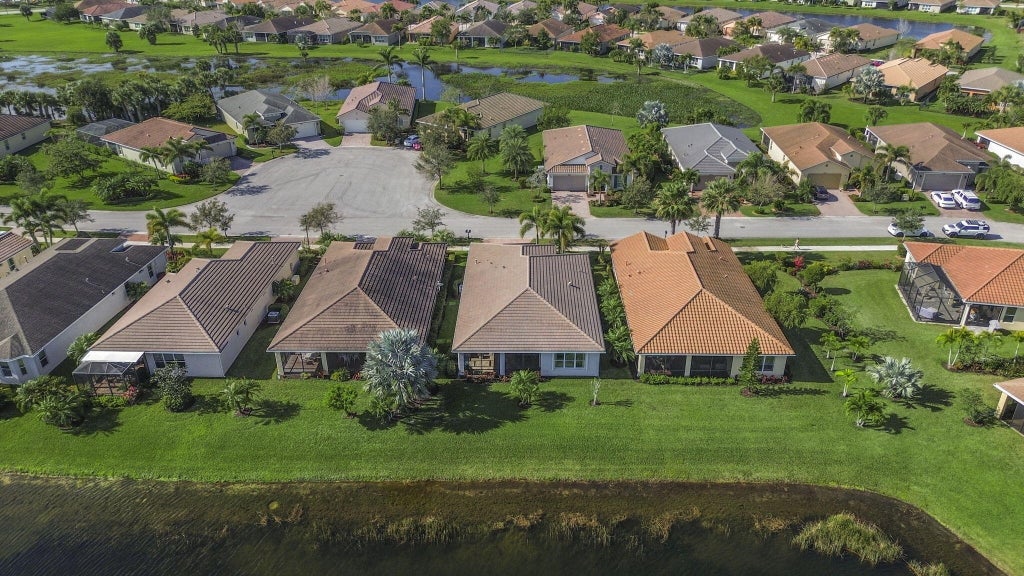 Photo of 9664 SW Royal Poinciana Drive, Port Saint Lucie, FL 34987 (MLS # R11064109)