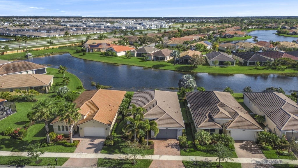 Photo of 9664 SW Royal Poinciana Drive, Port Saint Lucie, FL 34987 (MLS # R11064109)