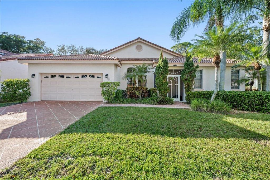 Photo of 180 Egret Circle, Greenacres, FL 33413 (MLS # R11146595)