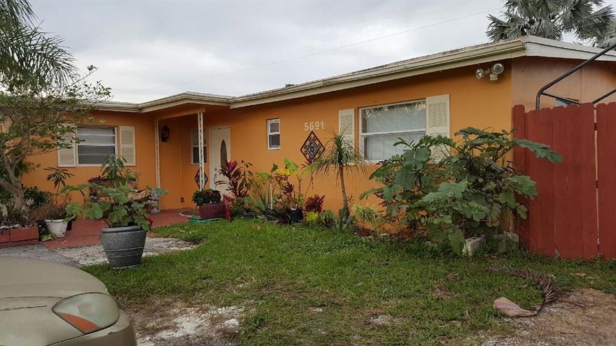 Corner Lot. Beautifully updated 4 Bed/2 Bath pool home. Large tiled marble floors throughout, stainless steel appliances, granite counter tops. Fenced backyard, extra storage. Lots of fruit trees such as coconut, mango and papaya. Close to shopping, restaurants, parks and schools.