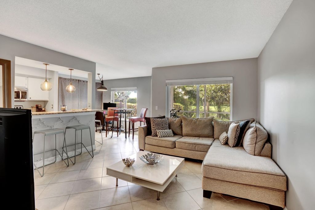 Photo of 815 W Boynton Beach Boulevard #6-104, Boynton Beach, FL 33426 (MLS # R10961252)