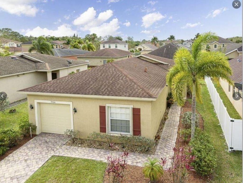 Photo of 9704 Windrift Circle, Fort Pierce, FL 34945 (MLS # F10428939)