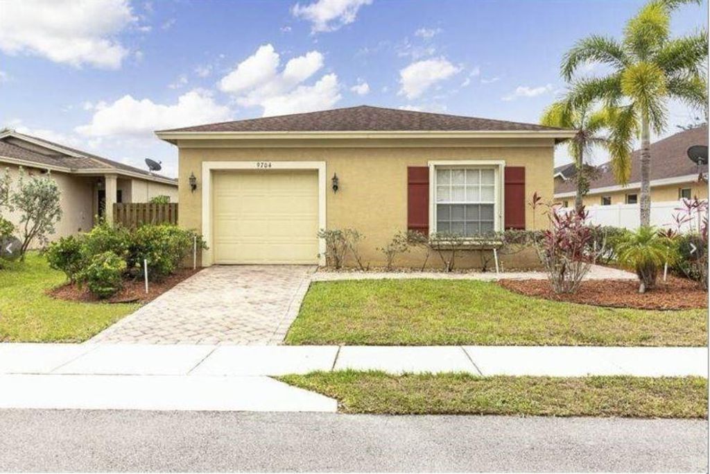 Photo of 9704 Windrift Circle, Fort Pierce, FL 34945 (MLS # F10428939)