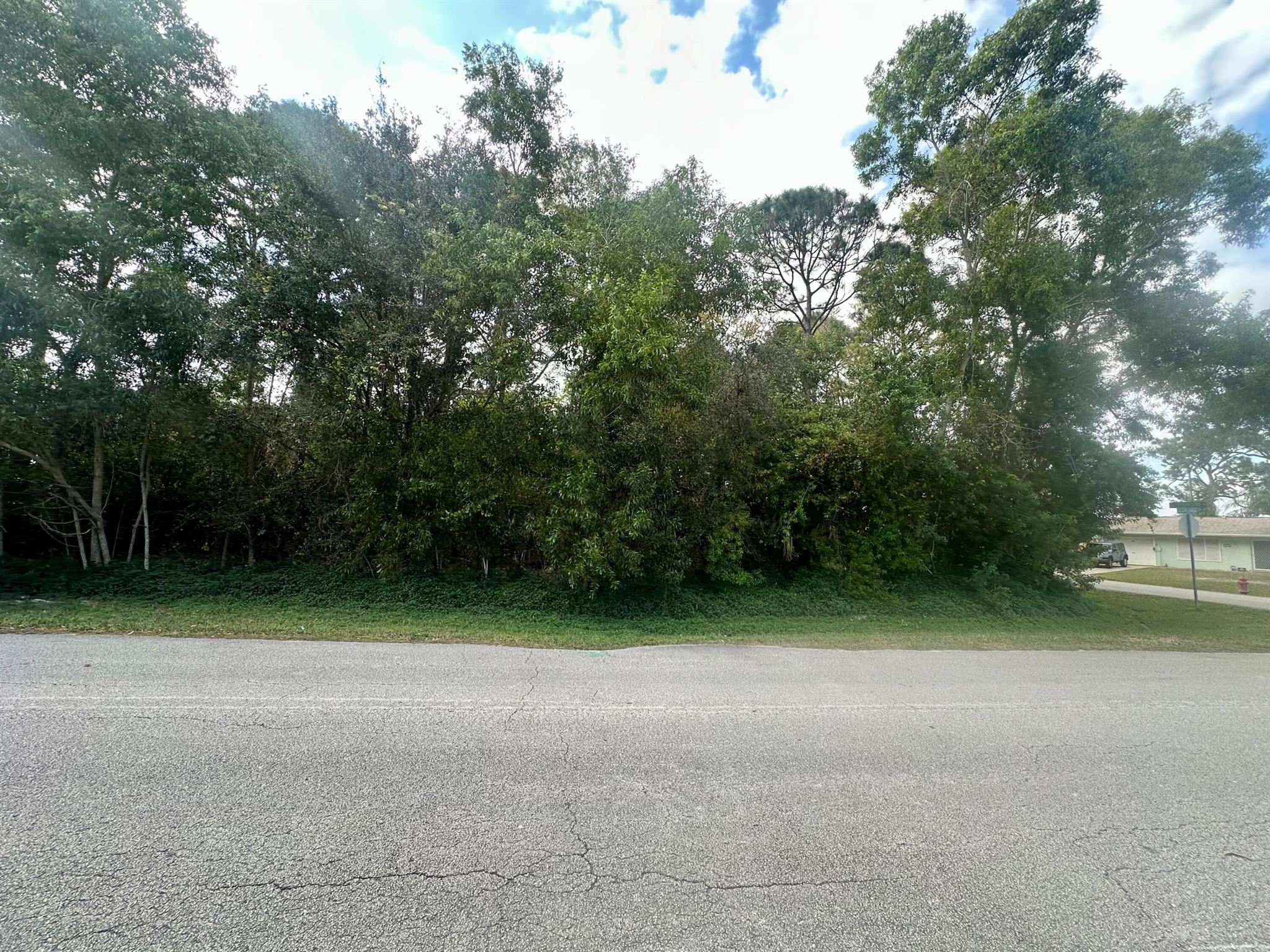 0.33 corner vacant lot perfect for your future home or a savvy investment! Don't let this opportunity pass by and miss out on this amazing opportunity. Short distance from SW Saint Lucie West Blvd shopping centers, Clover Park and Indian River State College-Pruitt Campus. Motivated Seller accepting offers!!
