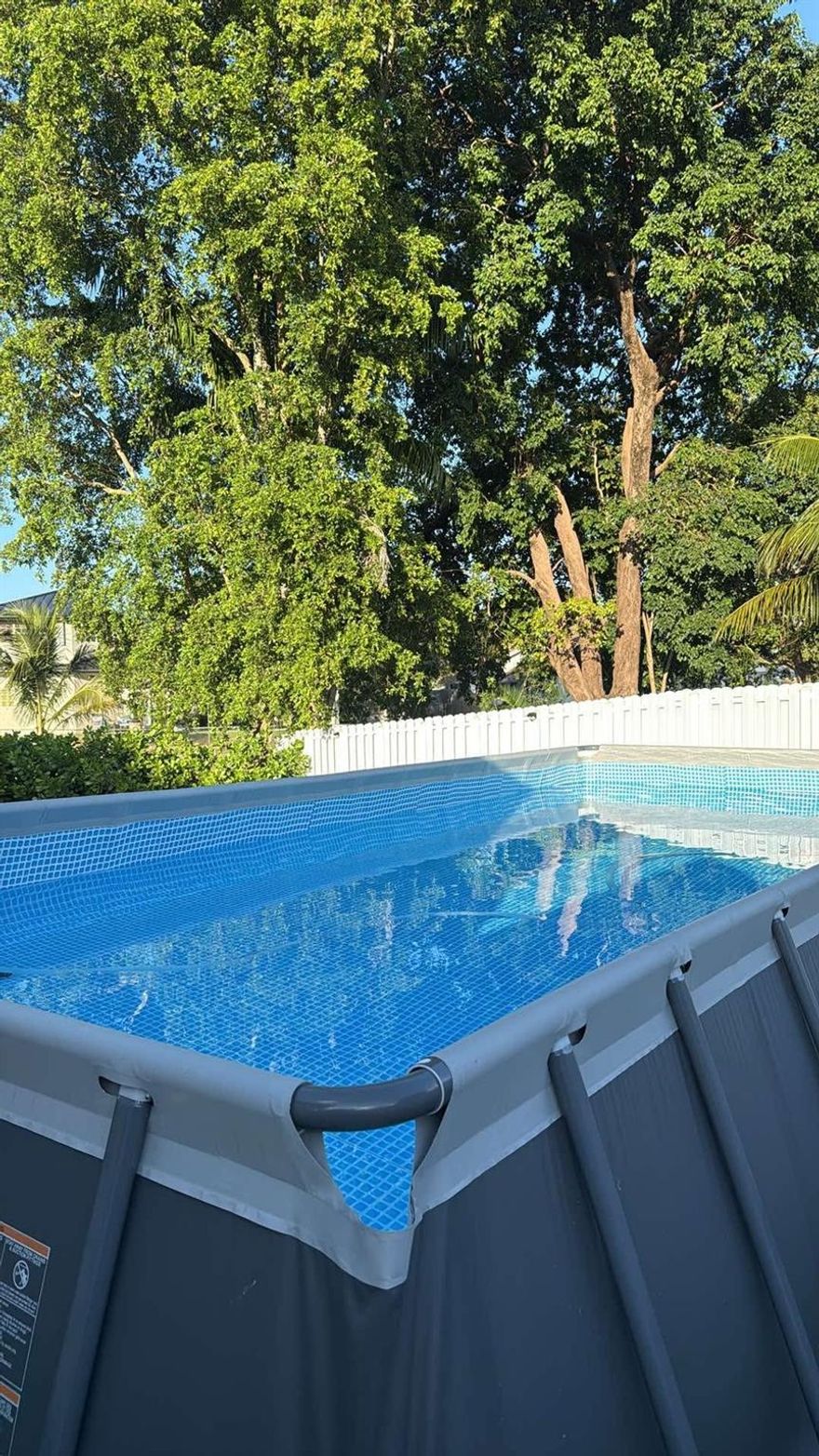 BEAUTIFUL 3 BEDROOM, 2 BATH POOL HOME OVERLOOKING A CANAL.  LARGE COVERED PATIO.  FENCED BACKYARD, AND AN ABOVE GROUND POOL, IDEAL FOR ENTERTAINING.  THIS IS A VERY RARE OPPORTUNITY AS THE RENT INCLUDES WATER, ELECTRIC, AND POOL SERVICE.  EXCELLENT LOCATION, CLOSE TO  SAWGRASS, RESTAURANTS, SHOPPING, AND HIGHWAYS.  OPEN FLOOR PLAN WITH ABUNDANT AMOUNT OF LIVING SPACE.  THIS PROPERTY HAS AN EFFICIENCY ON THE PREMISES WHICH IS CURRENTLY RENTED AND THERE IS ALSO AN RV ON THE PROPERTY THAT IS ALSO BEING RENTED OUT.  NO ASSOCIATION, QUICK MOVE IN.  GREAT OPPORTUNITY FOR SOMEONE TO HAVE THERE ELECTRIC, WATER, AND POOL SERVICE ALL INCLUDED IN THE RENT.  SHOW AND RENT!