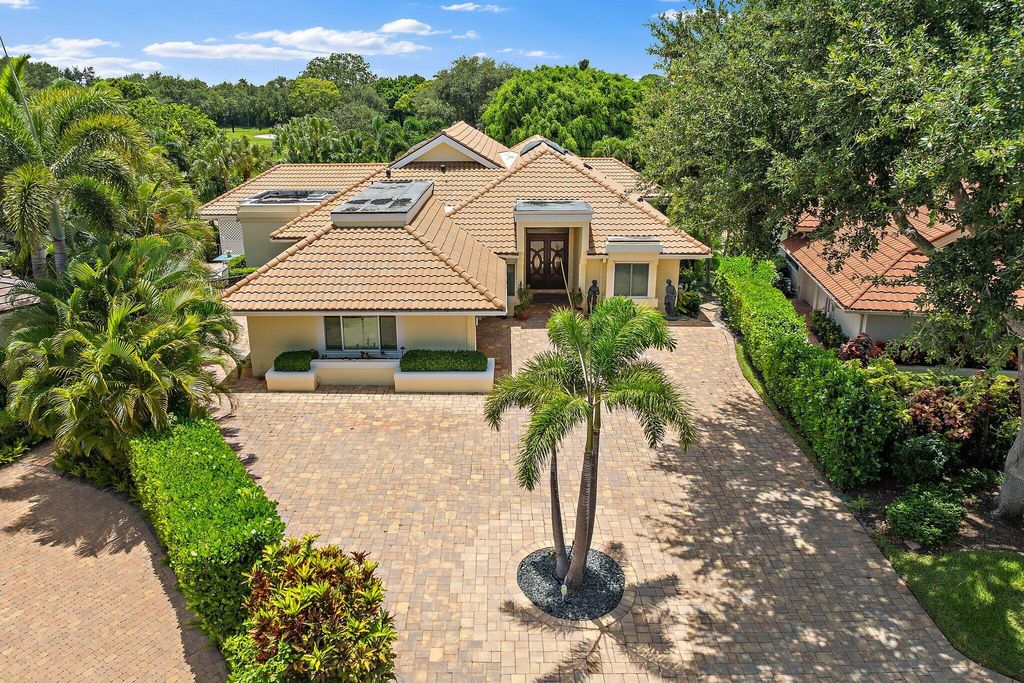 Photo of 13709 Rivoli Drive, Palm Beach Gardens, FL 33410 (MLS # R11098831)