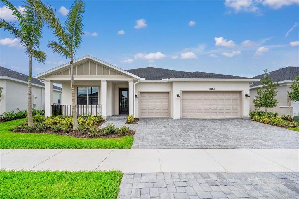 Photo of 6295 NW Sweetwood Drive, Port Saint Lucie, FL 34987 (MLS # R10990846)