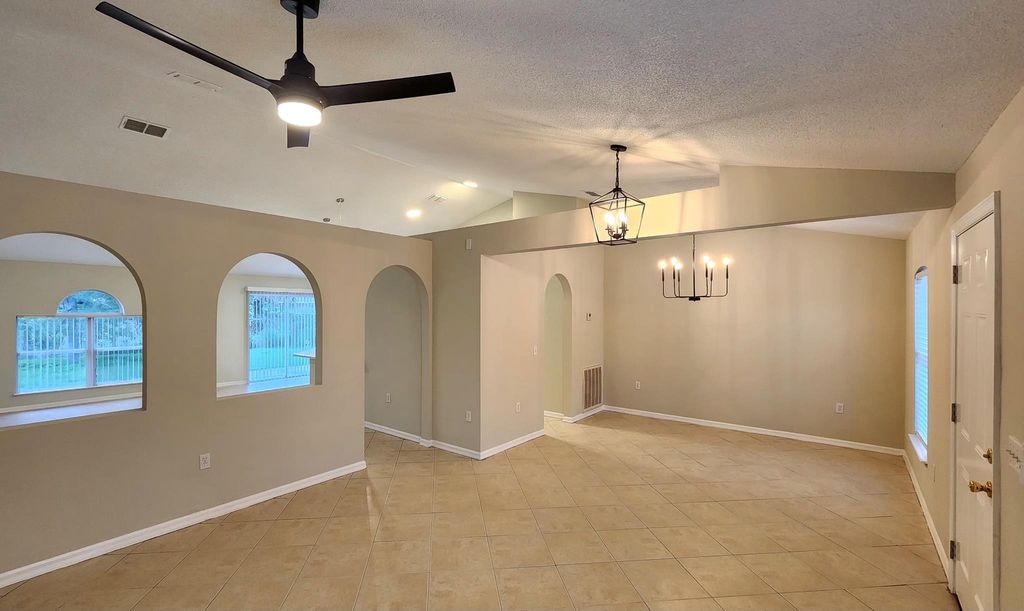 Photo of 4643 SW Carib Street, Port Saint Lucie, FL 34953 (MLS # R10992133)