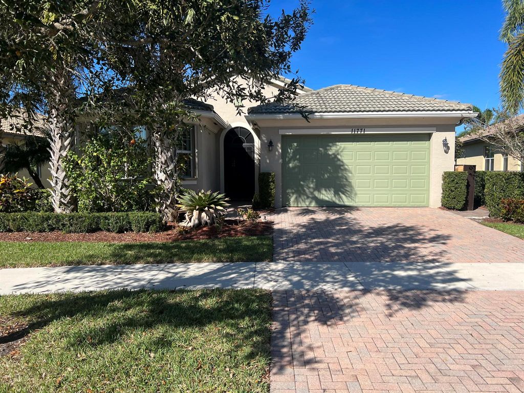 Photo of 11771 SW Crestwood Circle, Port Saint Lucie, FL 34987 (MLS # R10975561)