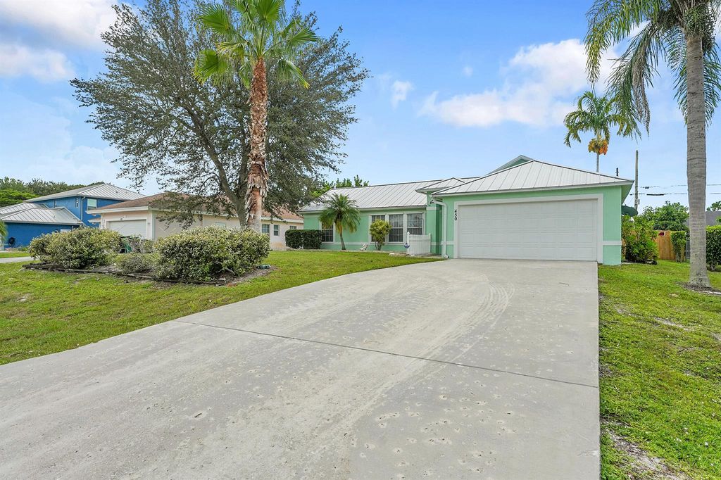 Photo of 450 SW Dauphin Avenue, Port Saint Lucie, FL 34953 (MLS # R11120622)