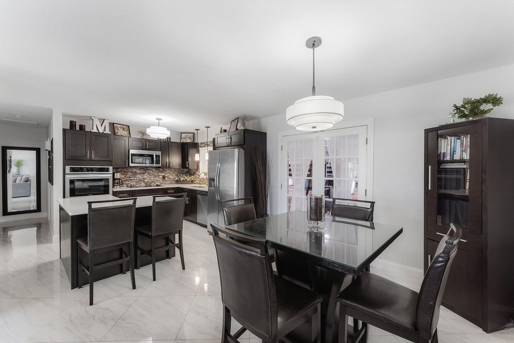Photo of 517 Ibis Drive, Delray Beach, FL 33444 (MLS # B26033100)