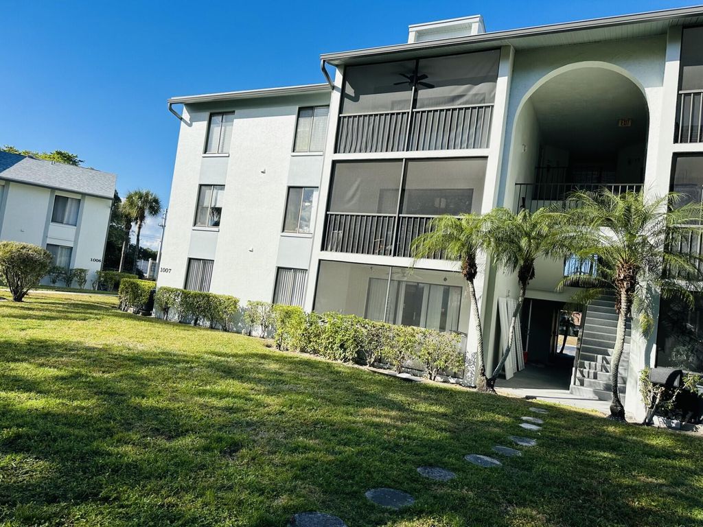 Photo of 1007 Green Pine Blvd #G3, West Palm Beach, FL 33409 (MLS # R11160793)