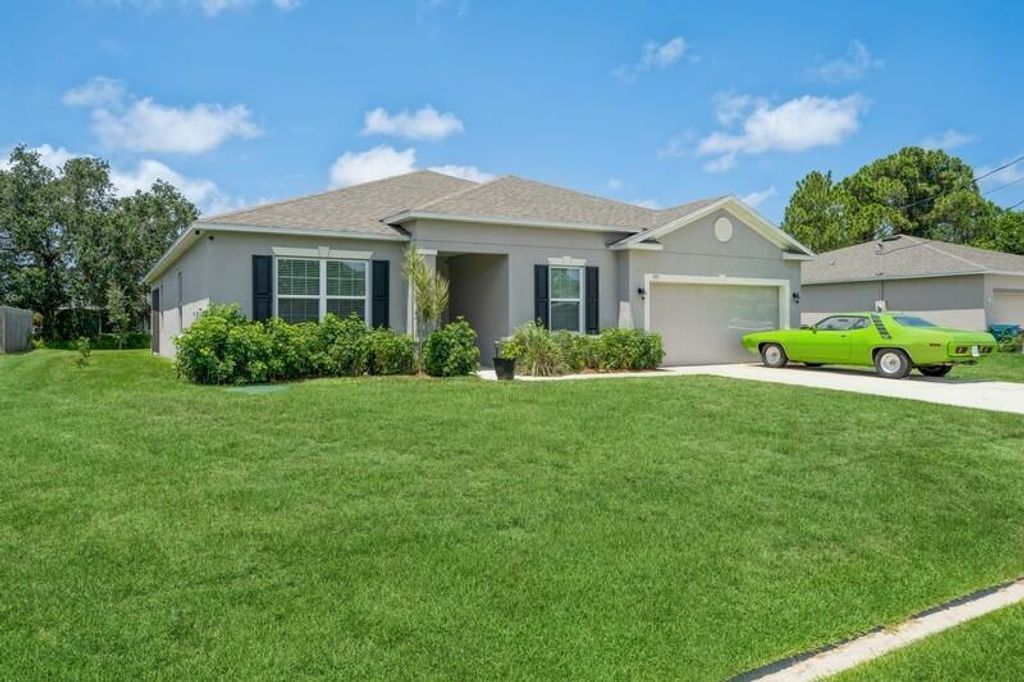 Photo of 977 SW Nichols Terrace, Port Saint Lucie, FL 34953 (MLS # R10809653)