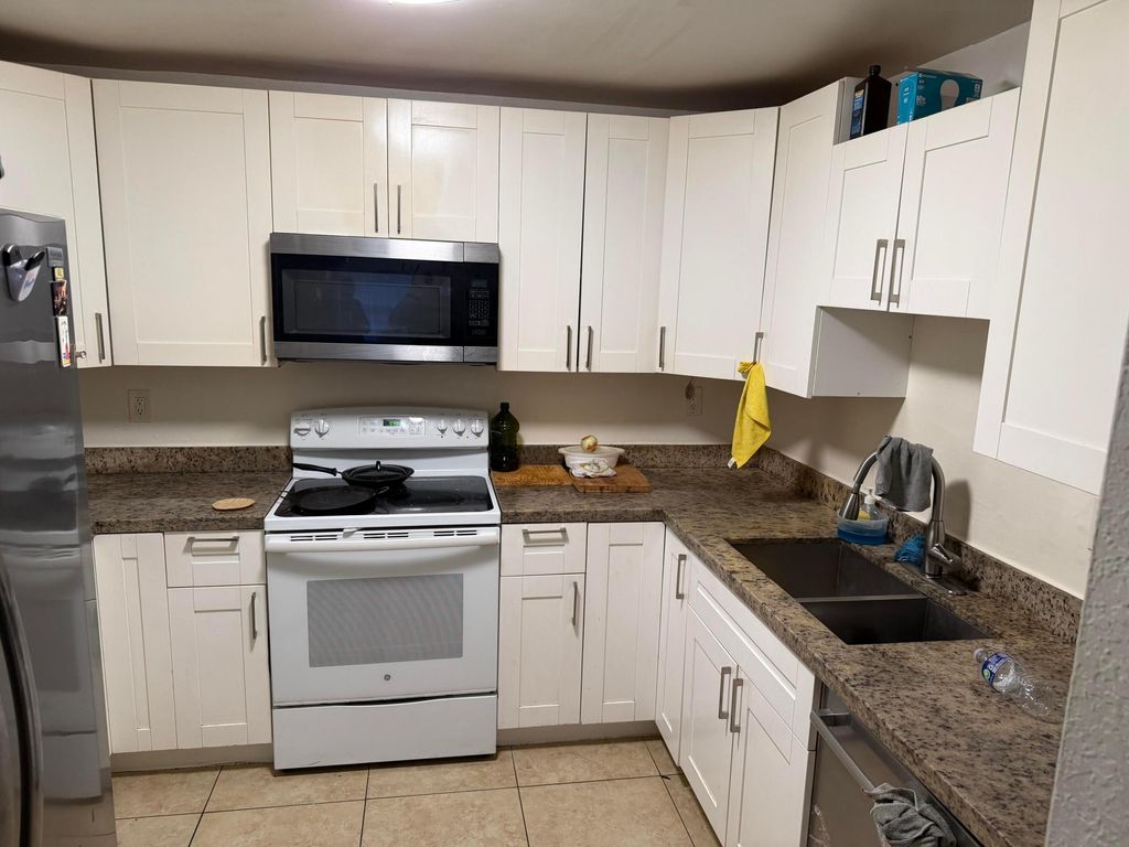 Photo of 3100 Coral Springs Dr #1i, Coral Springs, FL 33065 (MLS # B26001140)