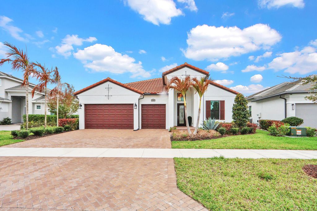 Photo of 9204 SW Arco Way, Port Saint Lucie, FL 34987 (MLS # B26006764)