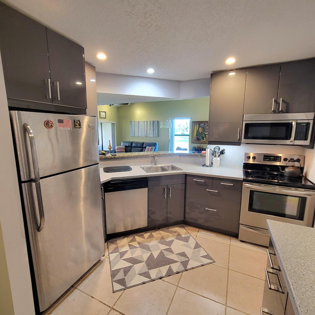 Photo of 13 Via De Casas Sur #104, Boynton Beach, FL 33426 (MLS # R11086462)