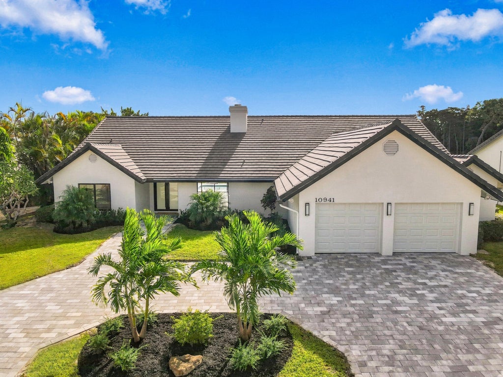 Photo of 10941 BOCA WOODS Lane, Boca Raton, FL 33428 (MLS # B26081830)