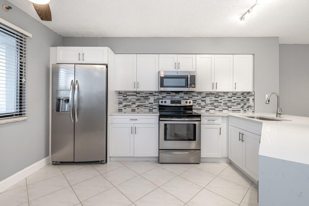 Photo of 2221 Cypress Island Drive #302, Pompano Beach, FL 33069 (MLS # F10416766)