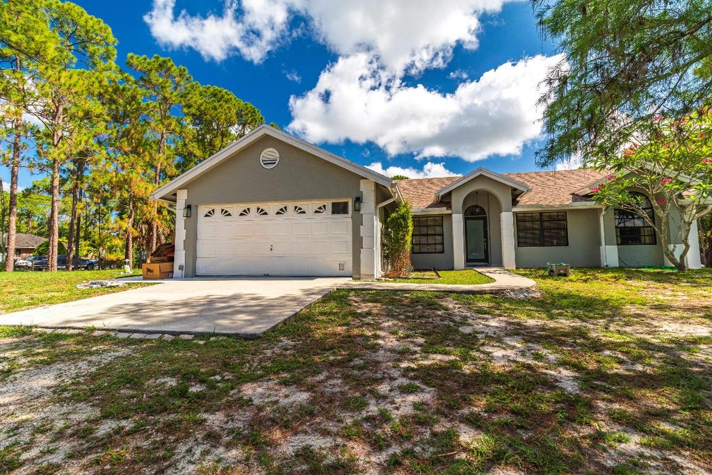 Photo of 17371 44 Th Place N, Loxahatchee, FL 33470 (MLS # R10991171)