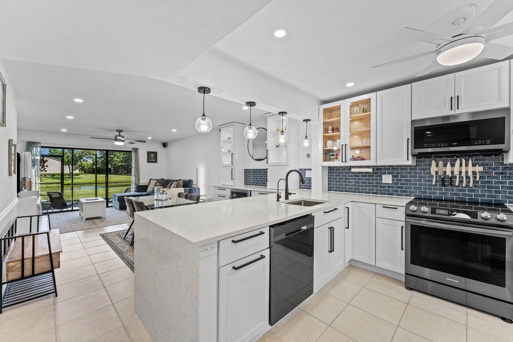 Photo of 8414 Boca Glades Boulevard E, Boca Raton, FL 33434 (MLS # B26068970)