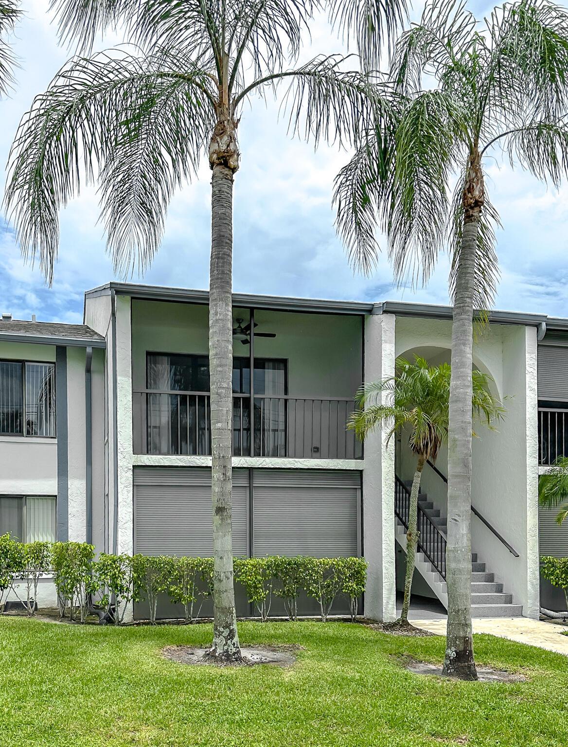 This stunning remodeled and spacious condo offers a modern and stylish living space. The renovated kitchen features sleek stainless steel appliances, beautiful granite counter tops, and gorgeous cabinetry. The remodeled bathrooms showcase contemporary fixtures and finishes. You'll be greeted by the inviting dark laminate wood floors that flow throughout the unit, adding a touch of elegance. The condo is part of a community that offers fantastic amenities, including a clubhouse, swimming pool, tennis, and walking paths around multiple lakes, where you can relax and unwind. With close proximity to the a variety of shopping, dining, and entertainment venues in West Palm Beach.