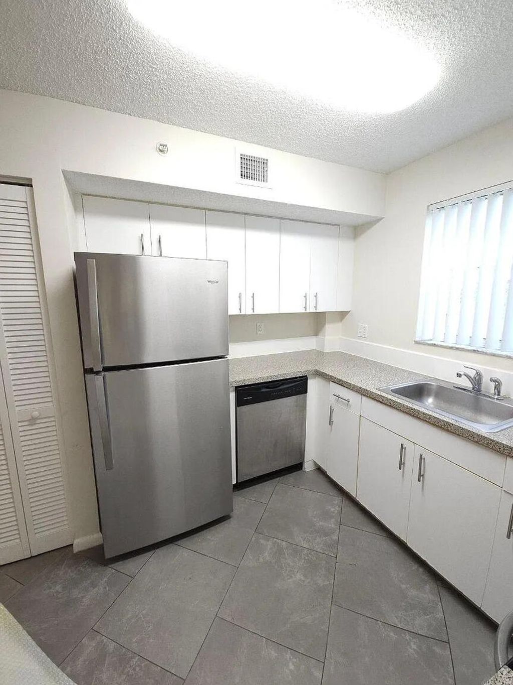 Photo of 751 N Pine Island Road, Plantation, FL 33324 (MLS # B26000318)