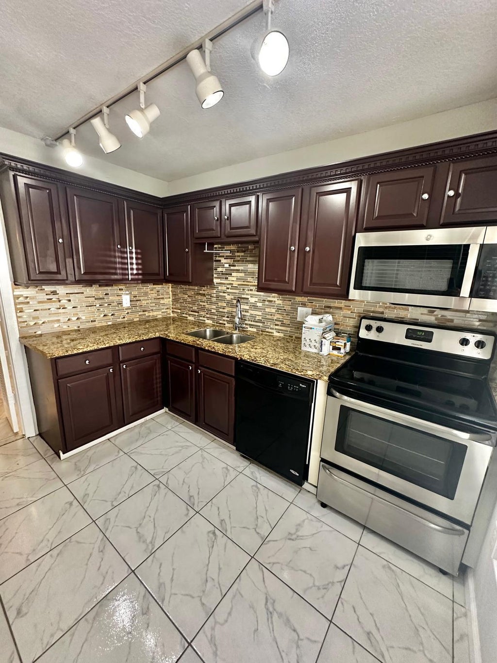 Photo of 4158 Inverrary Drive #202, Lauderhill, FL 33319 (MLS # B26059299)
