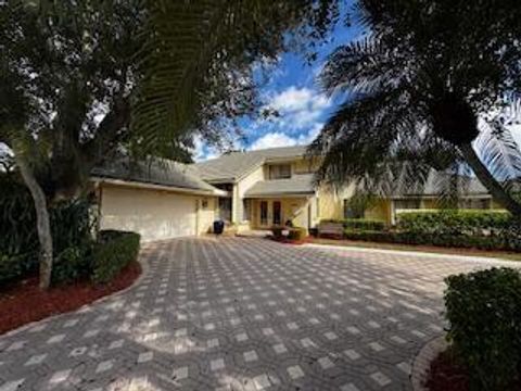 Photo of 12 Marlwood Lane, Palm Beach Gardens, FL 33418 (MLS # R11143707)