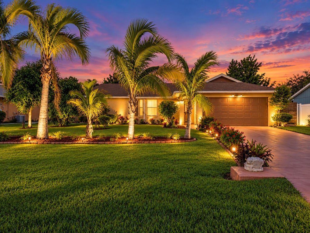 Photo of 1909 SW IDAHO Lane, Port Saint Lucie, FL 34953 (MLS # B26080908)