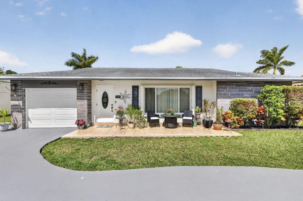 Photo of 7005 NW 95th Terrace, Tamarac, FL 33321 (MLS # B26019866)