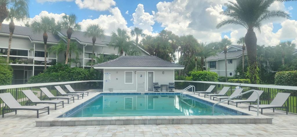 Photo of 11863 Wimbledon Circle #416, Wellington, FL 33414 (MLS # R11131244)