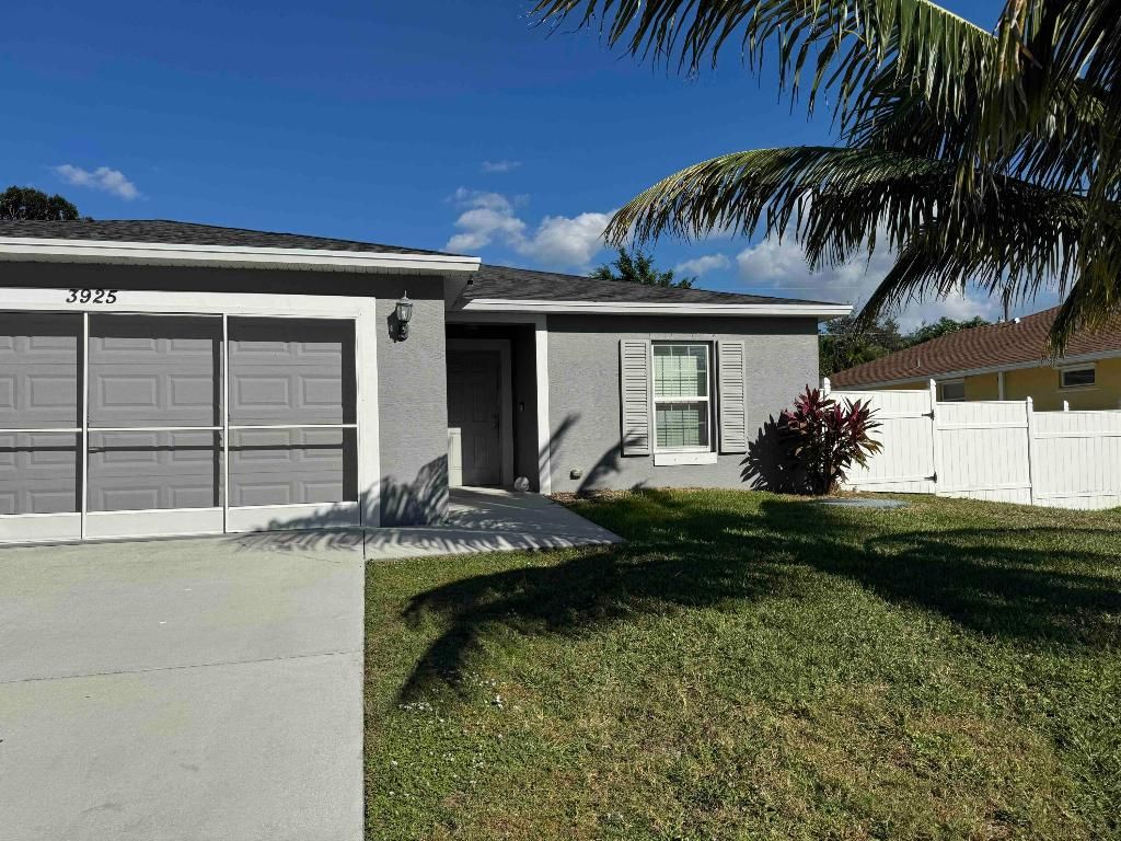 Photo of 3925 SW Laffite Street, Port Saint Lucie, FL 34953 (MLS # R11140604)